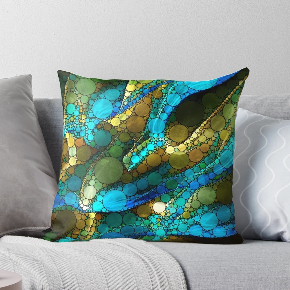 Peacock-inspired abstract art pillow in turquoise, blue, green, and black with gold accents
