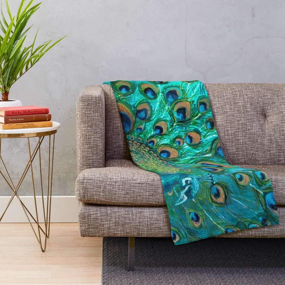 Colorful plush blanket featuring iridescent peafowl feather design
