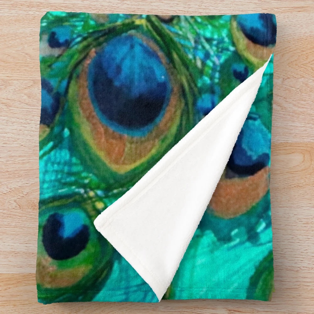 Colorful plush blanket featuring iridescent peafowl feather design