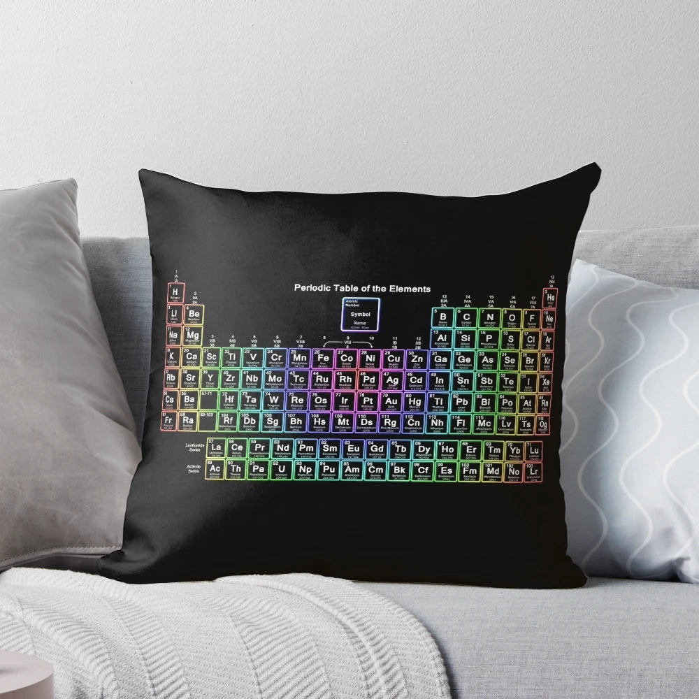 A colorful periodic table-themed pillow with a neon rainbow design, perfect for science lovers and geeks.