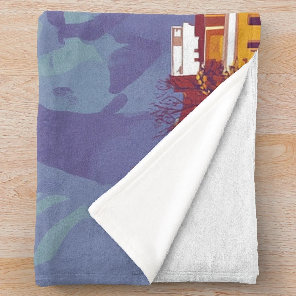 Colorful plush blanket featuring vibrant Peruvian art and cultural designs
