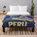 Colorful Peruvian art plush blanket featuring vibrant traditional patterns and indigenous designs