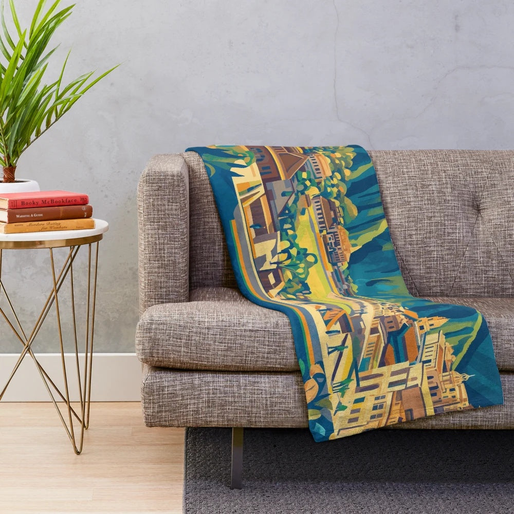 Colorful plush blanket featuring vibrant Peruvian cultural imagery and traditional art