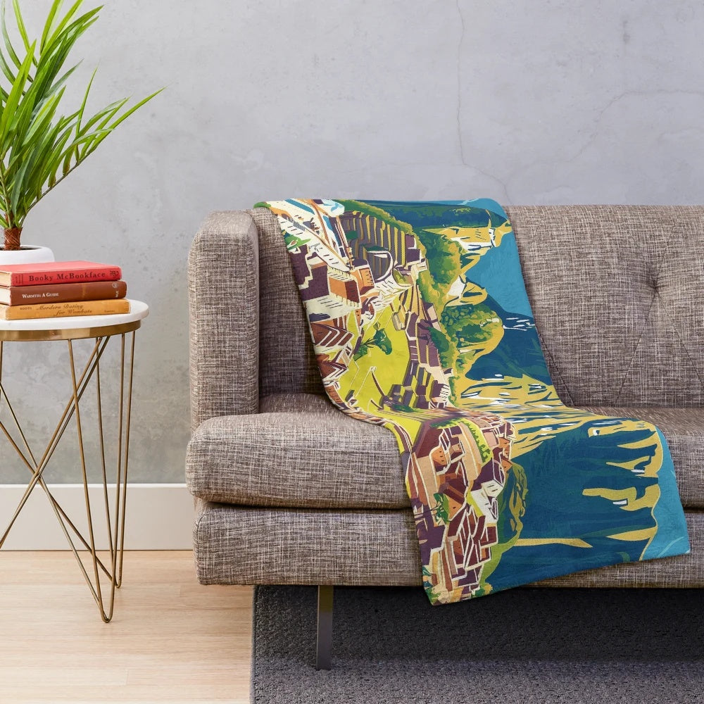 Colorful plush blanket featuring vibrant Peruvian-inspired art and design