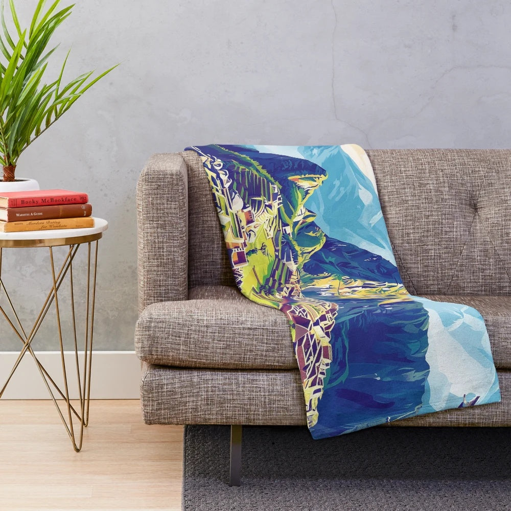 Vibrant Peruvian plush blanket featuring colorful traditional Peruvian art and cultural designs