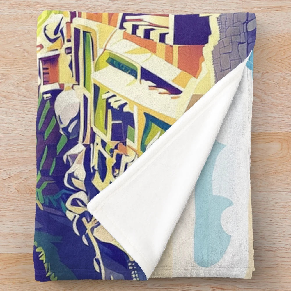 Vibrant Peruvian plush blanket featuring colorful traditional Peruvian art and cultural designs