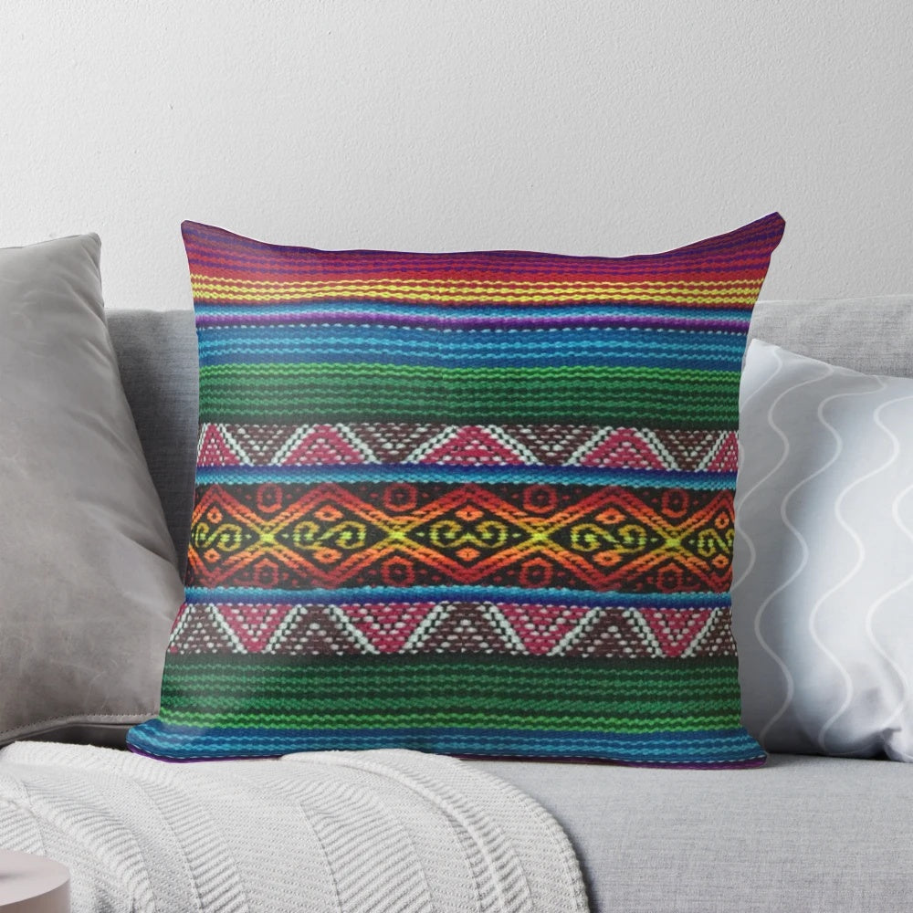 Colorful Peruvian textile pattern pillow featuring Inca and Quechua design elements