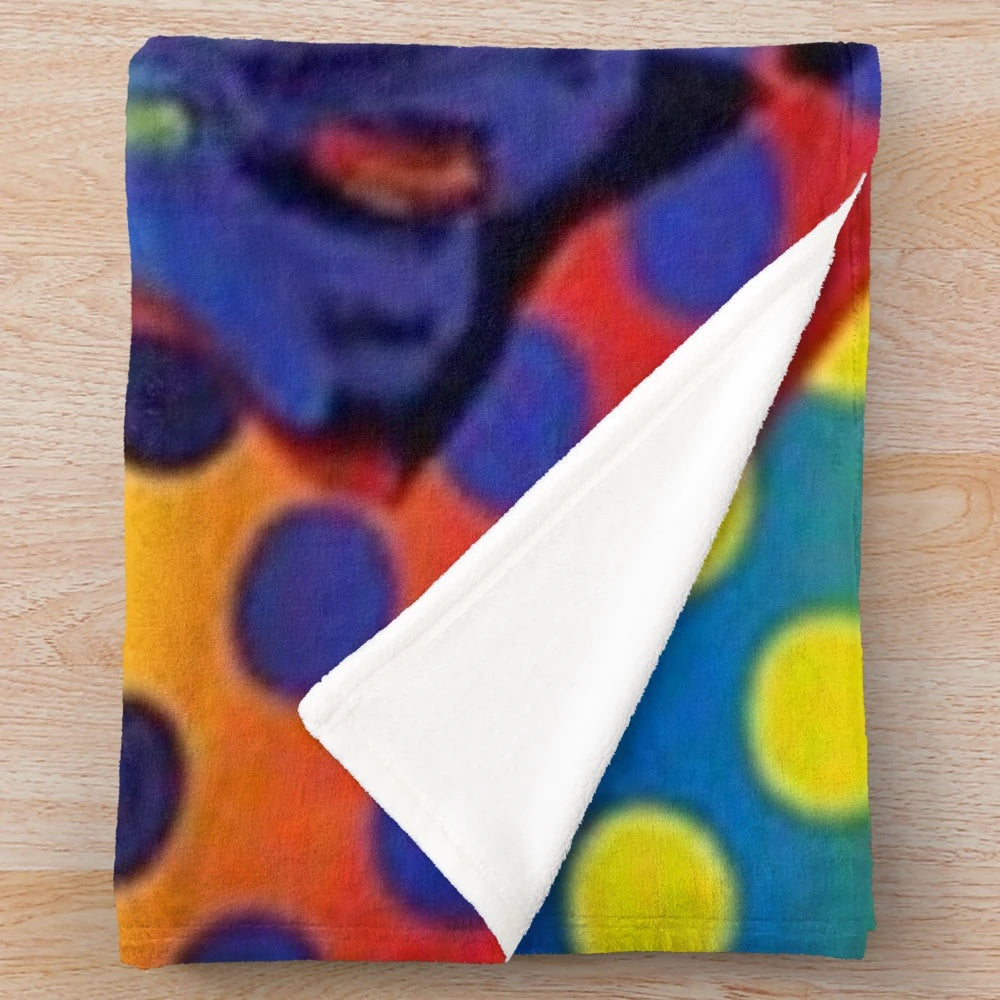 Colorful plush blanket featuring the Statue of Liberty design by artist Peter Max