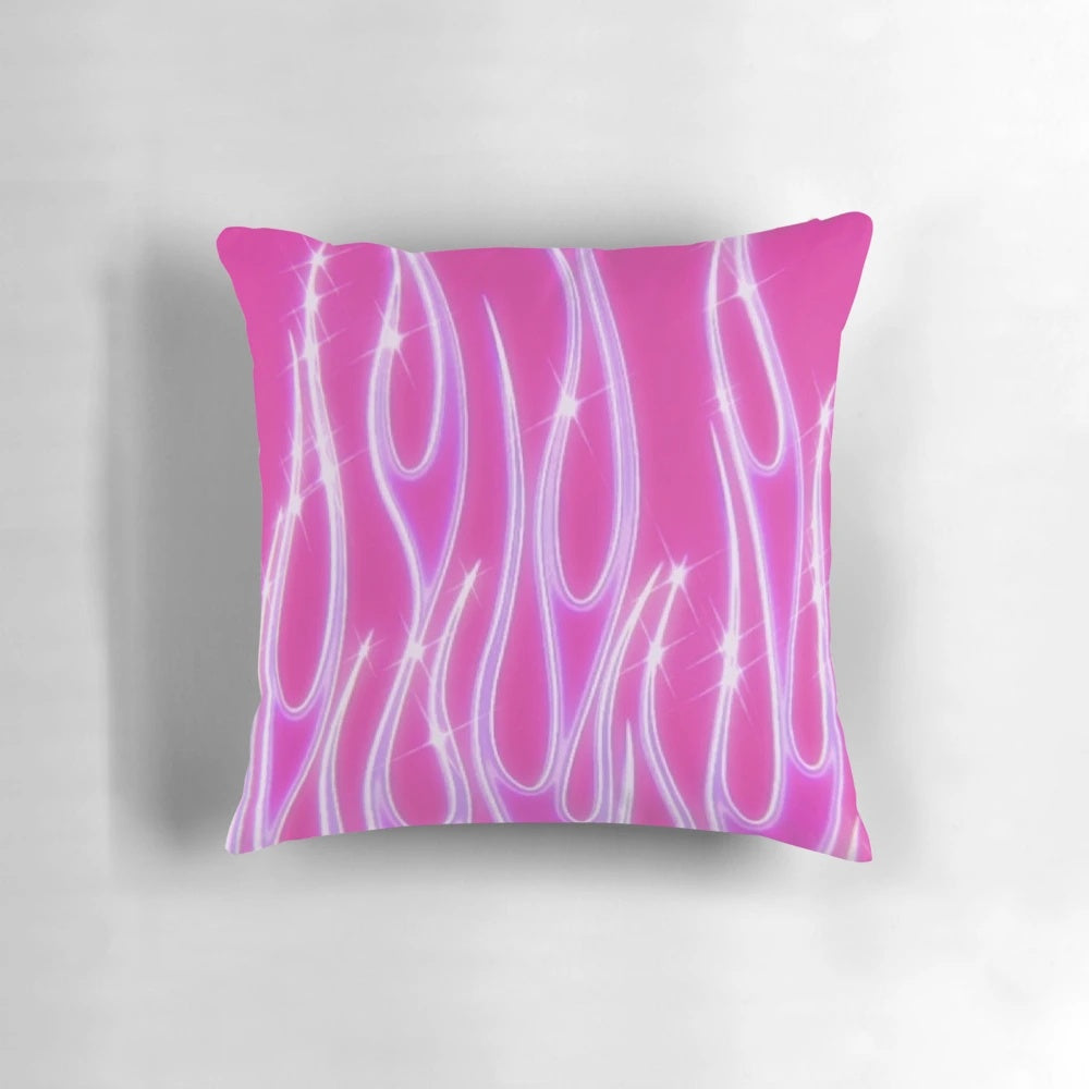 Bright pink pillow with flames and glittery accents, perfect for a y2k inspired aesthetic.