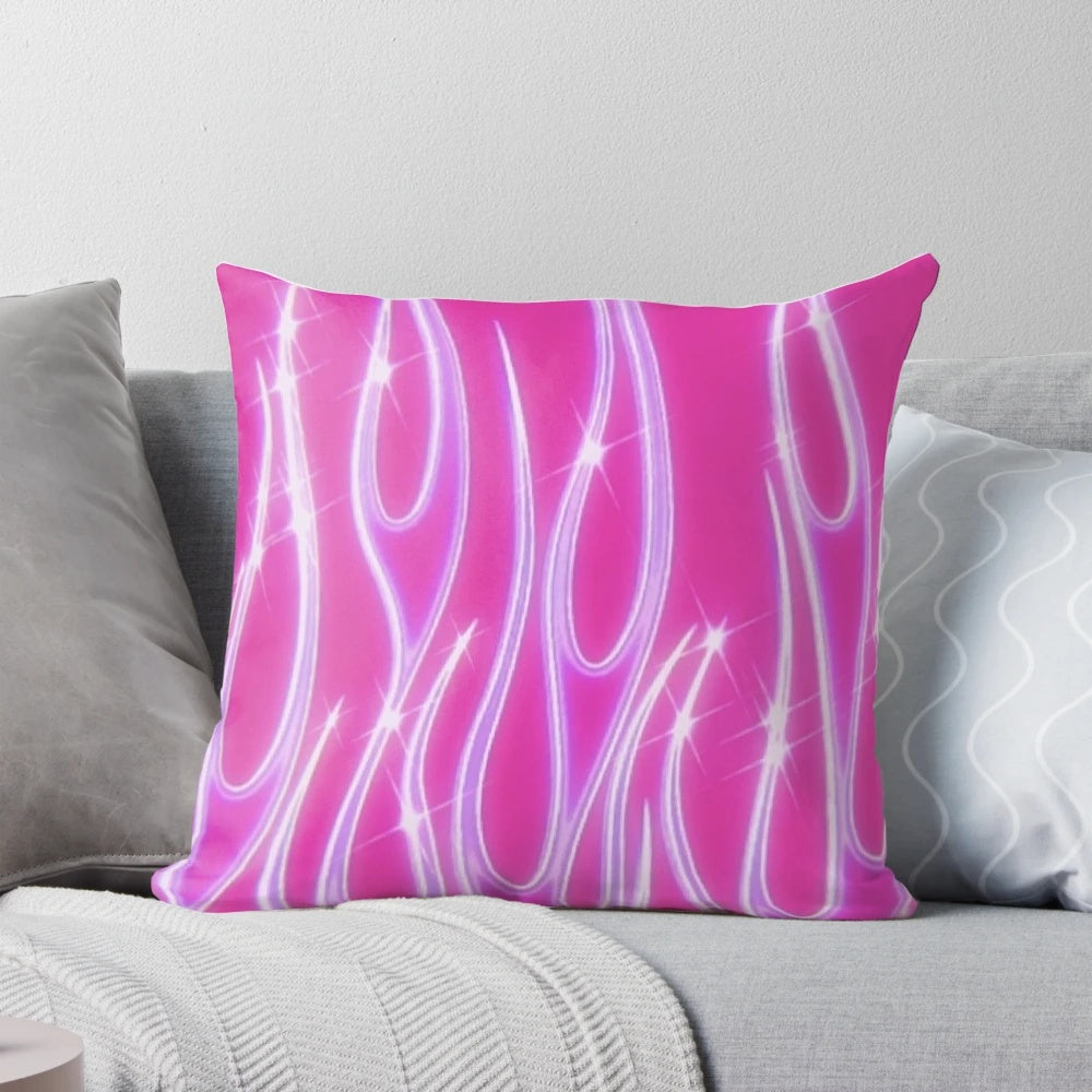 Bright pink pillow with flames and glittery accents, perfect for a y2k inspired aesthetic.