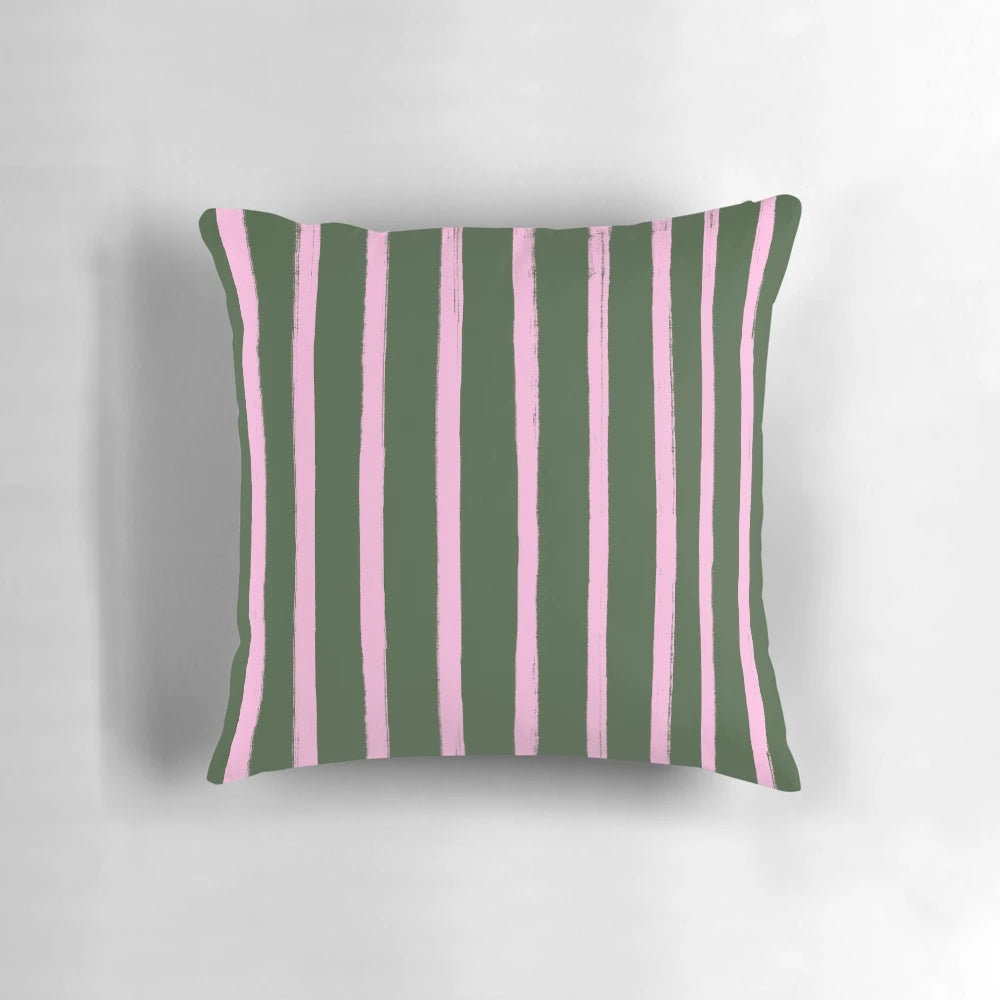 Pink and green striped pillow with a preppy, pastel design