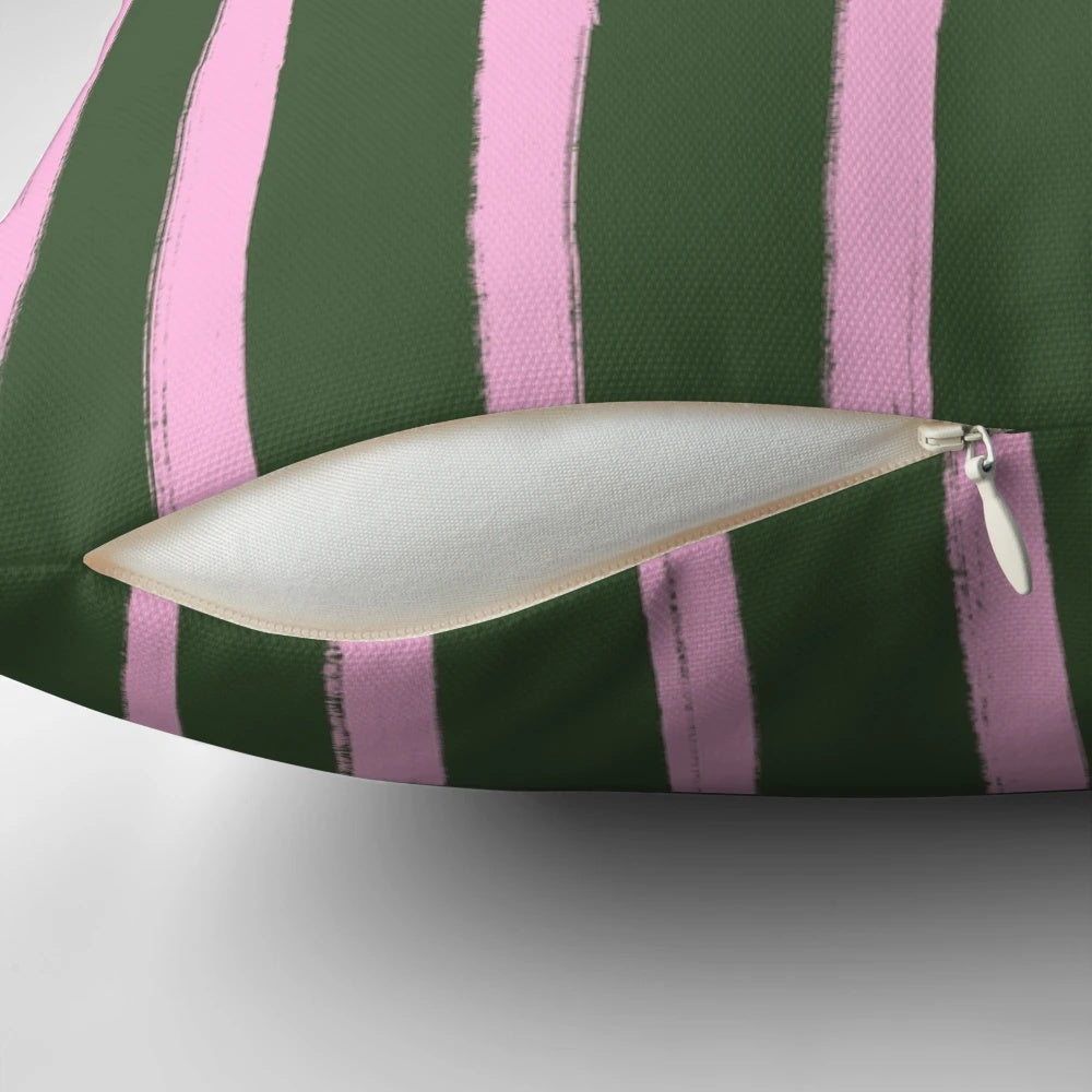 Pink and green striped pillow with a preppy, pastel design
