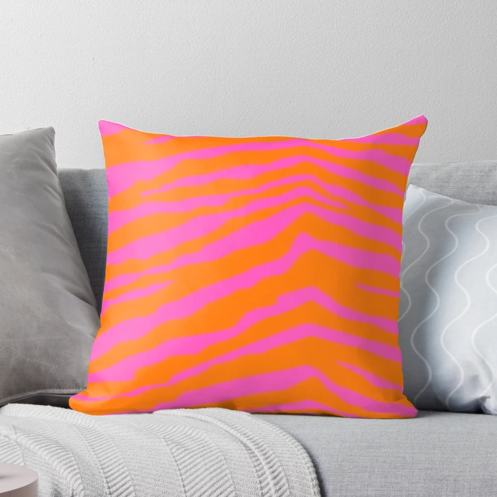 Bright and eye-catching pink and orange zebra print decorative pillow