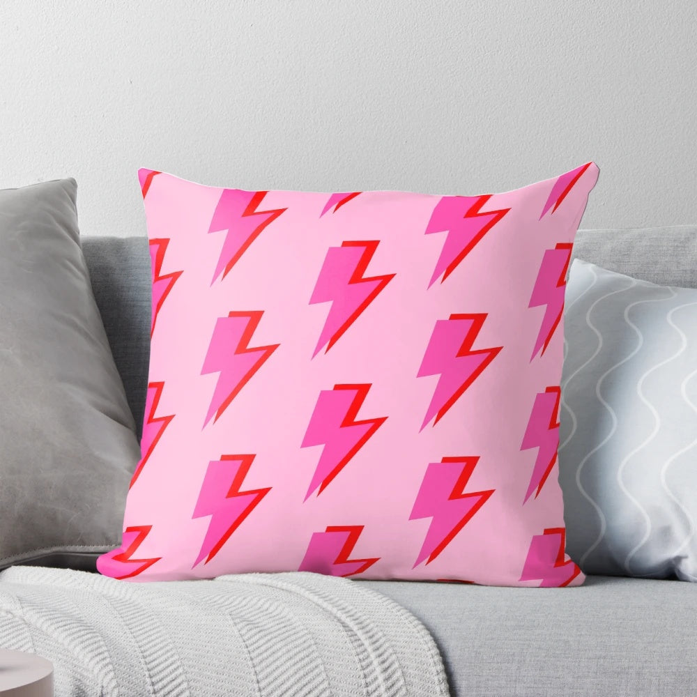 Vibrant pink and red lightning design on a soft, cozy pillow for a girl's bedroom or nursery.