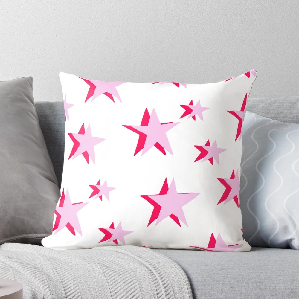 Soft, decorative pink and red star pattern pillow with a VSCO-inspired design