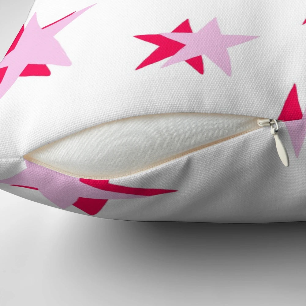 Soft, decorative pink and red star pattern pillow with a VSCO-inspired design