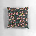 A beautifully designed pink floral pillow with a botanical, watercolor-inspired pattern.