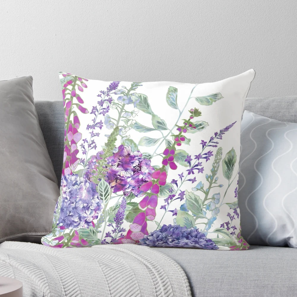 A beautiful pink and blue floral throw pillow featuring foxgloves and hydrangeas, designed by Fiona Calder.