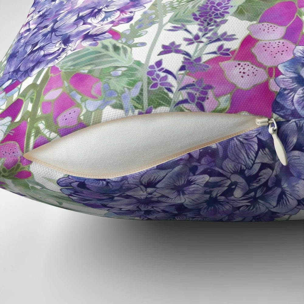 A beautiful pink and blue floral throw pillow featuring foxgloves and hydrangeas, designed by Fiona Calder.
