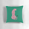 A vibrant pink leopard and cheetah pop art design on a throw pillow