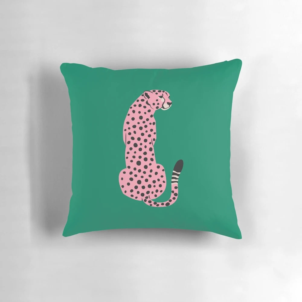 A vibrant pink leopard and cheetah pop art design on a throw pillow