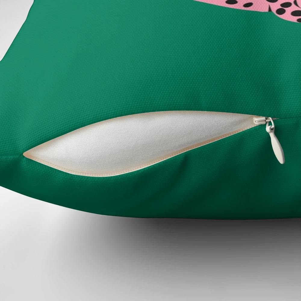 A vibrant pink leopard and cheetah pop art design on a throw pillow