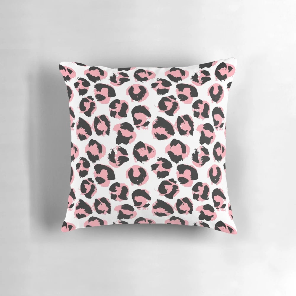 Pink leopard print pillow with lush, textured design inspired by African wildlife