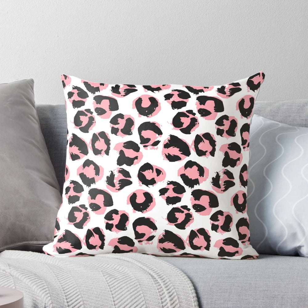 Pink leopard print pillow with lush, textured design inspired by African wildlife