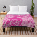 Trippy pink plush blanket with abstract, psychedelic pattern
