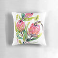 Vibrant pink protea watercolor painting with birds on a decorative throw pillow