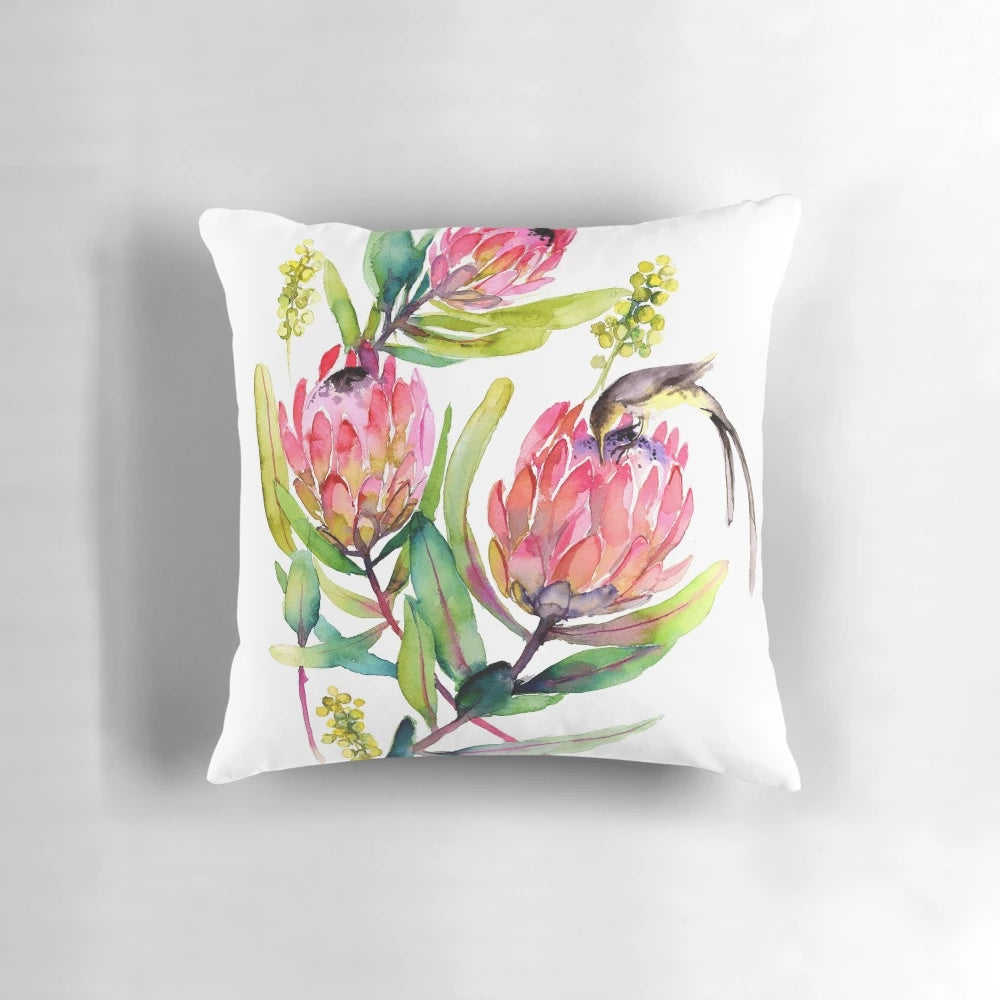 Vibrant pink protea watercolor painting with birds on a decorative throw pillow
