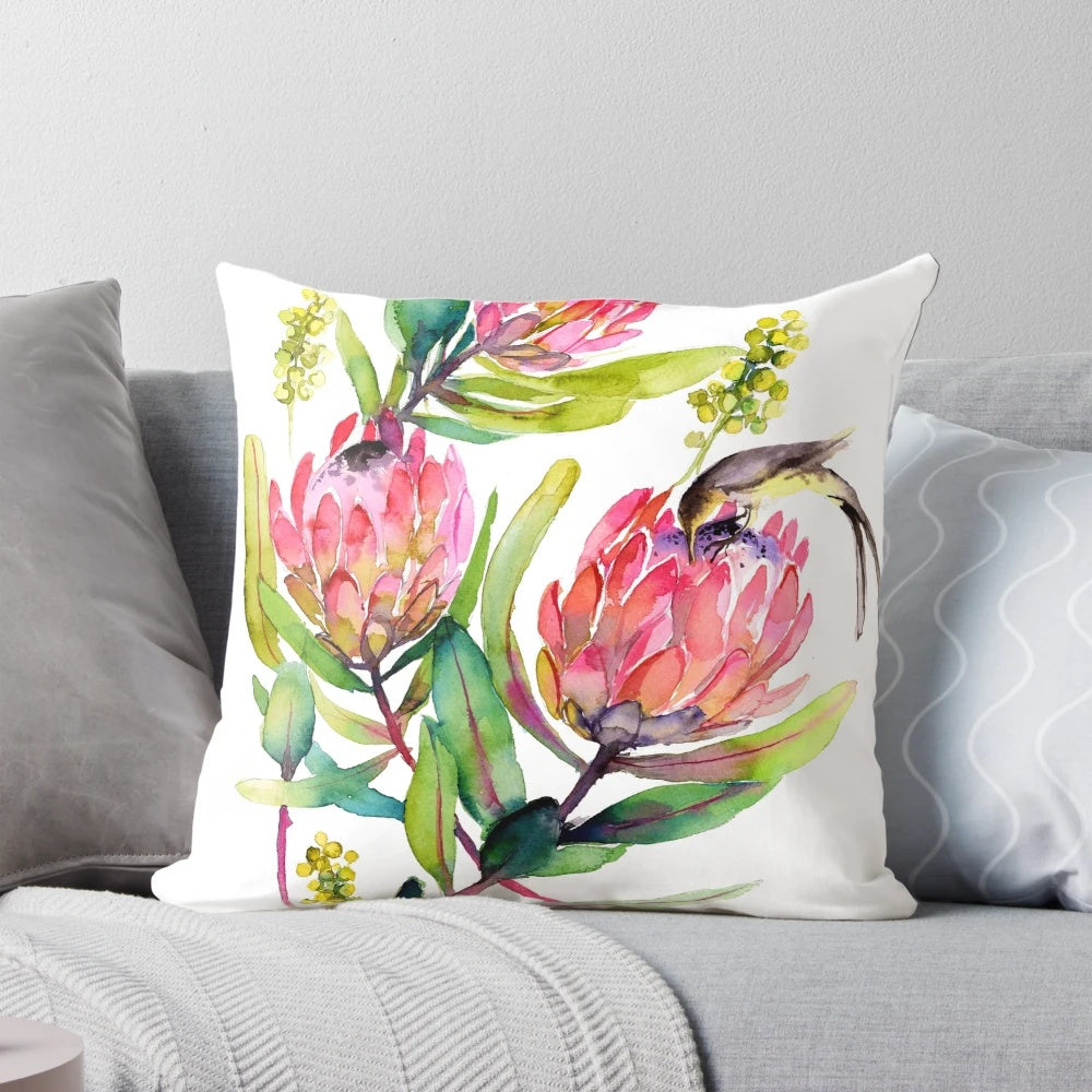 Vibrant pink protea watercolor painting with birds on a decorative throw pillow