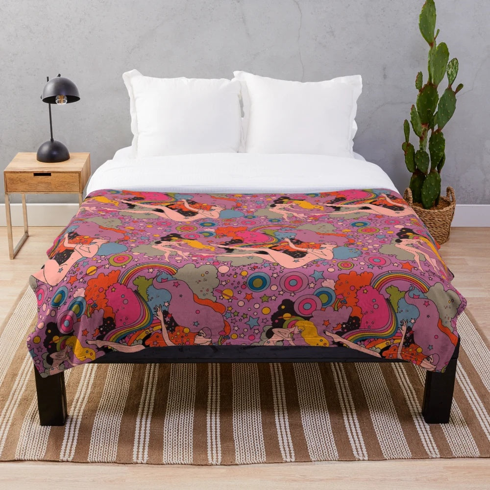 Cozy and vibrant pink and violet galaxy-themed plush blanket
