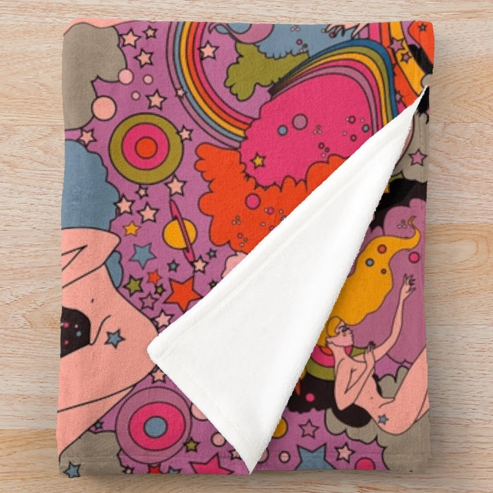 Cozy and vibrant pink and violet galaxy-themed plush blanket