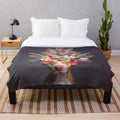 Pit bull dog wearing a flower crown on a plush blanket, focus on flower power design