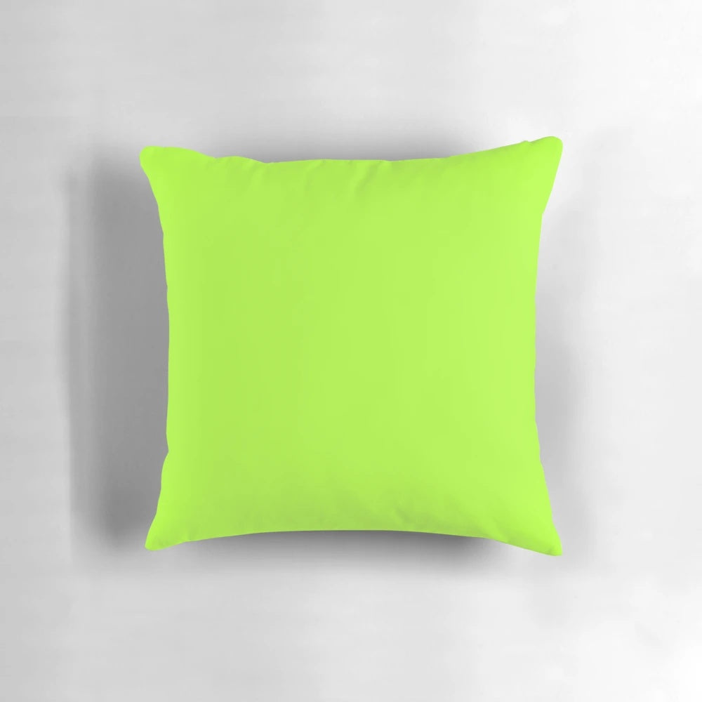 A plain, solid green and yellow pillow with a vibrant, sunny color palette.