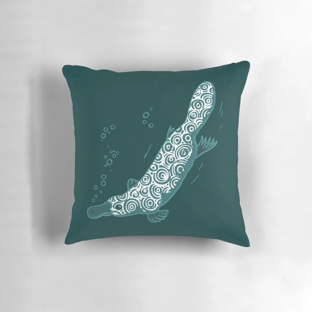 Colorful graphic art pillow featuring a detailed illustration of a platypus, an egg-laying, venomous aquatic mammal.