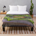 Plush blanket featuring a botanical, abstract pool garden design