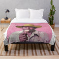 Colorful plush blanket featuring a vibrant South American-inspired design