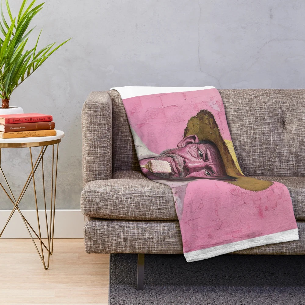 Colorful plush blanket featuring a vibrant South American-inspired design