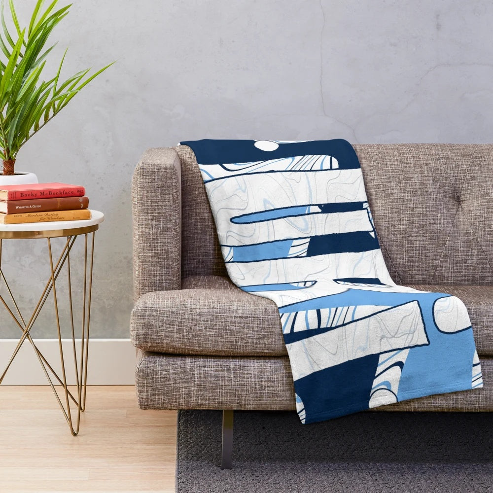 Vibrant plush blanket in psychedelic waves design, perfect for college dorms and university of rhode island fans