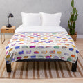 Plush blanket with colorful sea slug or nudibranch design