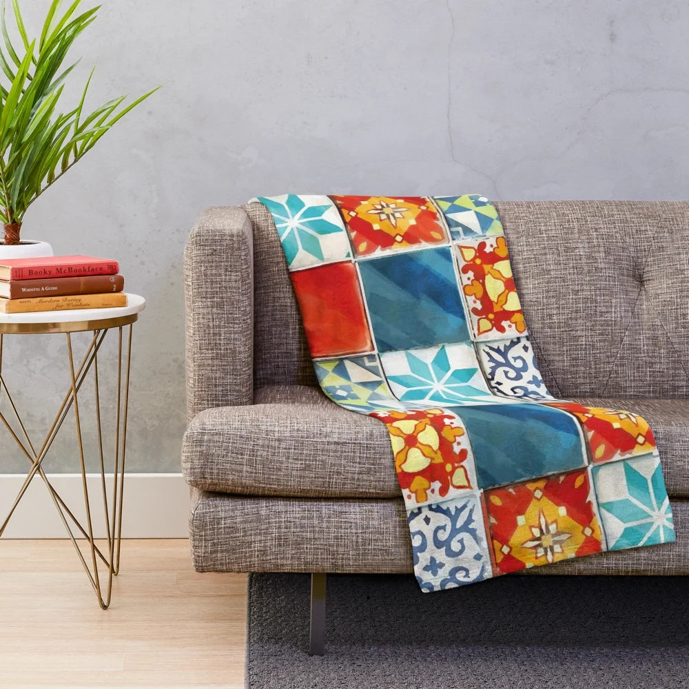 Colorful plush blanket featuring an abstract mosaic design inspired by azulejo tiles from the Azul board game