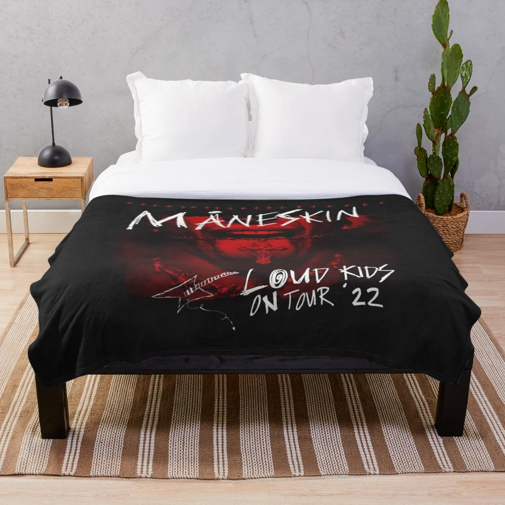 Colorful plush blanket featuring the band fourman's logo and tour graphics