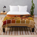 Colorful plush blanket with Wes Anderson's The Royal Tenenbaums movie palette
