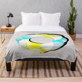 Colorful plush blanket featuring a vibrant, abstract mandala design