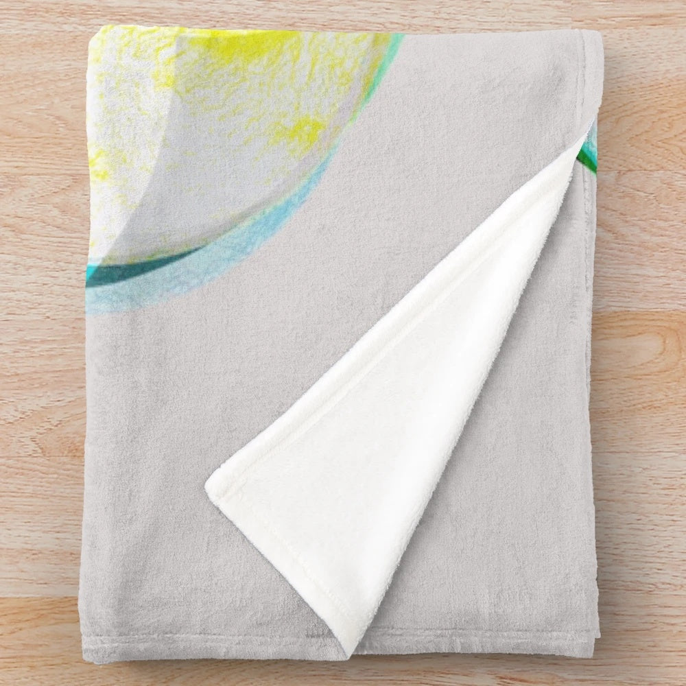 Colorful plush blanket featuring a vibrant, abstract mandala design