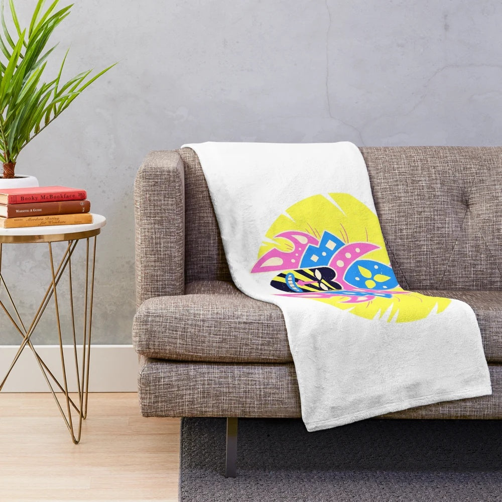 Colorful plush blanket with tribal, geometric pattern inspired by the Ati-Atihan festival in the Philippines