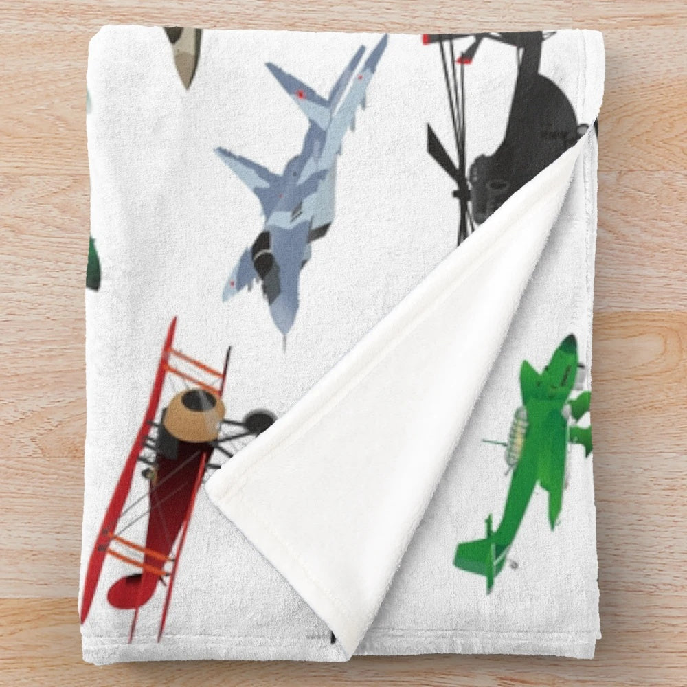 Colorful plush blanket featuring various aviation-themed patterns