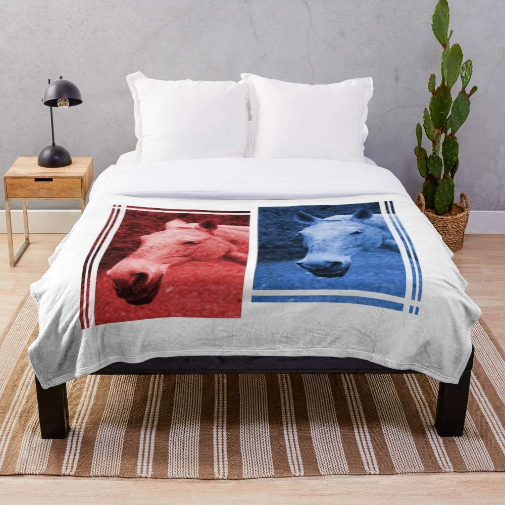Soft, plush blanket featuring a blurred image of horses in red and blue
